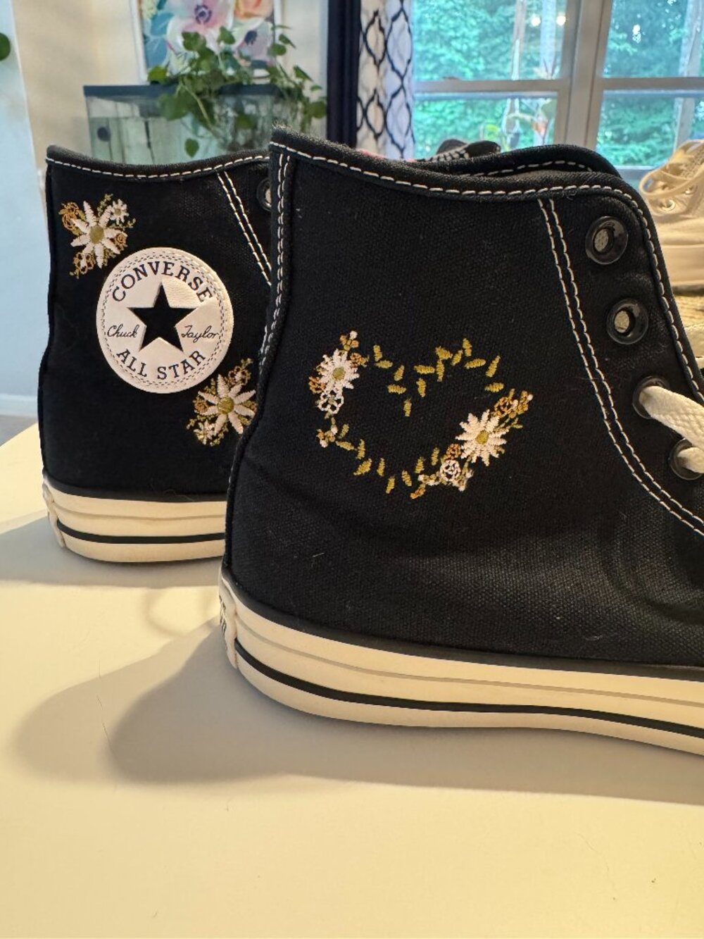 are Converse Chuck Taylor High Top Black Embroidered Daisy LEFT RIGHT Sneakers W